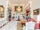 Elegant two-story entry with marble floors, chandelier, and ornate columns at 1503 Limona Rd, Brandon, FL 33510
