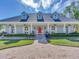 House with a long driveway, and manicured landscaping at 1503 Limona Rd, Brandon, FL 33510