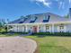 House with a long driveway, and manicured landscaping at 1503 Limona Rd, Brandon, FL 33510