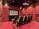 Elegant home theater with plush seating and large screen at 1503 Limona Rd, Brandon, FL 33510