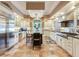 Large kitchen with granite island, stainless steel appliances, and tile floors at 1503 Limona Rd, Brandon, FL 33510