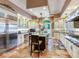 Gourmet kitchen boasts granite counters, stainless steel appliances, and custom cabinetry at 1503 Limona Rd, Brandon, FL 33510