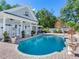 Stunning pool with spacious pool house and landscape at 1503 Limona Rd, Brandon, FL 33510