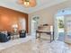 Relaxing sitting room with two armchairs, a table, and access to a pool at 1503 Limona Rd, Brandon, FL 33510