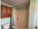 Bathroom with bathtub and wood cabinet at 1710 7Th Sw St # 83, Ruskin, FL 33570