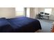Spacious bedroom with a workspace and large bed at 1710 7Th Sw St # 83, Ruskin, FL 33570