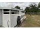 Rear view of the property showing a lattice-fenced patio area at 1710 7Th Sw St # 83, Ruskin, FL 33570