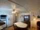 Kitchen with white cabinets, granite countertops, and a dining table at 1710 7Th Sw St # 83, Ruskin, FL 33570