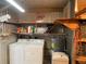 Clean laundry room with shelving at 1710 7Th Sw St # 83, Ruskin, FL 33570