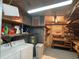 Laundry room with washer, dryer, and shelving at 1710 7Th Sw St # 83, Ruskin, FL 33570