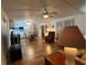 Open concept living and dining area with hardwood floors at 1710 7Th Sw St # 83, Ruskin, FL 33570