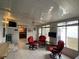 Bright sunroom with comfy seating and a fireplace at 1710 7Th Sw St # 83, Ruskin, FL 33570