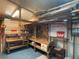 Well-equipped workshop with workbench, tools, and ample storage at 1710 7Th Sw St # 83, Ruskin, FL 33570