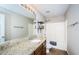 Clean bathroom with granite vanity and shower/tub combo at 17443 Glenapp Dr, Land O Lakes, FL 34638