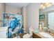 Bathroom with a shower and granite vanity at 17443 Glenapp Dr, Land O Lakes, FL 34638