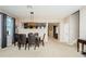 Formal dining room with a six-chair table and open concept design at 17443 Glenapp Dr, Land O Lakes, FL 34638