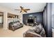 Living room with neutral walls, two sofas, and a TV at 17443 Glenapp Dr, Land O Lakes, FL 34638