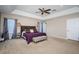 Spacious primary bedroom with plush carpet and neutral tones at 17443 Glenapp Dr, Land O Lakes, FL 34638