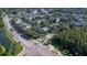 Aerial view of community, showing buildings, pool, and roads at 18119 Sterling Gate Cir # 18119, Tampa, FL 33647
