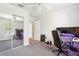 Bedroom with mirrored closet doors and a workspace at 18119 Sterling Gate Cir # 18119, Tampa, FL 33647