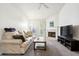 Living room with fireplace and comfortable seating at 18119 Sterling Gate Cir # 18119, Tampa, FL 33647