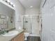 Clean bathroom with a large shower and updated vanity at 20922 Jaffa Ln, Land O Lakes, FL 34637