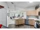 Galley kitchen with stainless steel appliances at 20922 Jaffa Ln, Land O Lakes, FL 34637