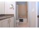Bathroom with granite countertop and bathtub at 2501 Sapphire Greens Ln, Sun City Center, FL 33573