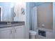 Bathroom with granite countertop and bathtub at 2501 Sapphire Greens Ln, Sun City Center, FL 33573