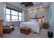 Main bedroom with lake view and ceiling fan at 2501 Sapphire Greens Ln, Sun City Center, FL 33573