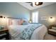King-size bedroom with a ceiling fan and window shutters at 2501 Sapphire Greens Ln, Sun City Center, FL 33573