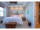 Spacious bedroom with king-size bed and calming decor at 2501 Sapphire Greens Ln, Sun City Center, FL 33573