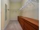 Large walk-in closet with ample shelving and drawers at 2501 Sapphire Greens Ln, Sun City Center, FL 33573
