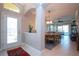 Bright and spacious entryway leading to dining and living areas at 2501 Sapphire Greens Ln, Sun City Center, FL 33573
