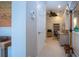 Hallway with home office, desk, chair, and ceiling fan at 2501 Sapphire Greens Ln, Sun City Center, FL 33573
