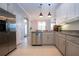 Modern kitchen with stainless steel appliances and granite countertops at 2501 Sapphire Greens Ln, Sun City Center, FL 33573