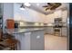 Modern kitchen with stainless steel appliances and granite countertops at 2501 Sapphire Greens Ln, Sun City Center, FL 33573