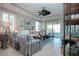 Relaxing living room with comfortable seating and access to patio at 2501 Sapphire Greens Ln, Sun City Center, FL 33573