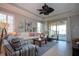 Living room with a sofa, armchairs, and a coffee table at 2501 Sapphire Greens Ln, Sun City Center, FL 33573