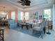 Bright and airy living room with access to backyard at 2501 Sapphire Greens Ln, Sun City Center, FL 33573