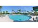 Large, inviting resort-style pool with lounge chairs at 2501 Sapphire Greens Ln, Sun City Center, FL 33573