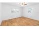 Well-lit bedroom with hardwood floors and ample space at 2755 Morningside Dr, Clearwater, FL 33759
