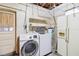 Convenient laundry room with washer, dryer, and extra storage at 2755 Morningside Dr, Clearwater, FL 33759