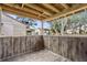 Covered balcony overlooking community trees and homes at 3303 Brigadoon Dr, Clearwater, FL 33759