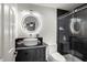 Modern bathroom with floating vanity and walk-in shower at 3303 Brigadoon Dr, Clearwater, FL 33759