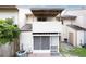 Rear view of home showcasing patio and screened enclosure at 3303 Brigadoon Dr, Clearwater, FL 33759
