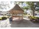 Community gazebo with wood-like structure and lattice at 3303 Brigadoon Dr, Clearwater, FL 33759