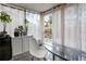 Bright sunroom with glass walls and plenty of natural light at 3303 Brigadoon Dr, Clearwater, FL 33759