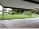 Covered carport with a view of the backyard at 3916 W Oklahoma Ave, Tampa, FL 33616