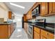 Bright kitchen with stainless steel appliances and ample cabinetry at 3916 W Oklahoma Ave, Tampa, FL 33616